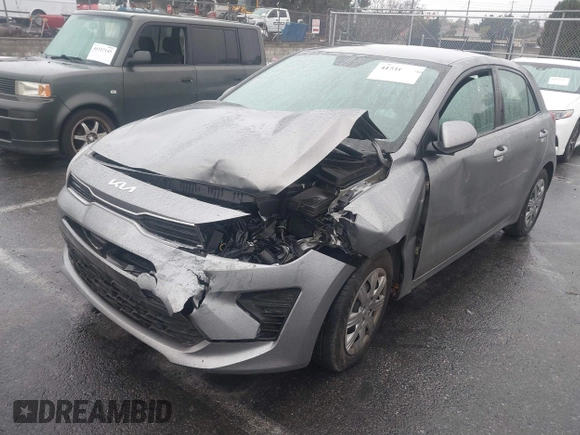 2022 Kia Rio S with VIN 3KPA25AD9NE500847, listed as a IAAI auction lot 41516061 with 38,828 mi miles and . Bid and sale history available at DreamBid. Image 17.