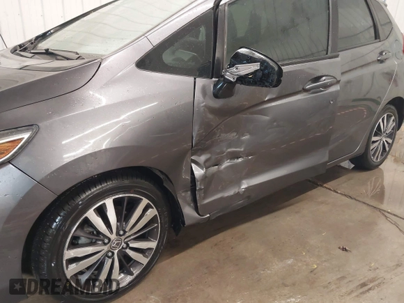 2015 Honda Fit EX-L with VIN 3HGGK5H85FM755006, listed as a IAAI auction lot 41034606 with 97,294 mi miles and . Bid and sale history available at DreamBid. Image 6.