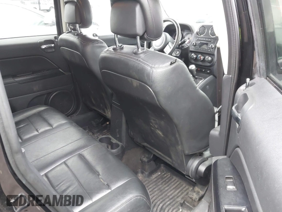 2016 Jeep Patriot Latitude with VIN 1C4NJRFB1GD523904, listed as a IAAI auction lot 42017736 with 164,705 mi miles. Bid and sale history available at carsss.com. Image 8.