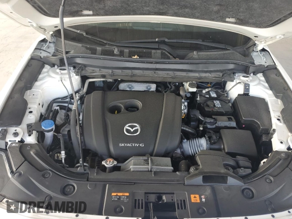 2021 Mazda CX-5 Sport with VIN JM3KFABM4M0388344, listed as a Copart auction lot 50724805 with 24,554 mi miles and Salvage Title. Bid and sale history available at carsss.com. Image 12.