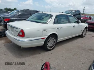 2007 Jaguar XJ Vanden Plas with VIN SAJWA82B77SH16109, listed as a IAAI auction lot 42749658 with 185,772 mi miles and . Bid and sale history available at DreamBid. Image 4.