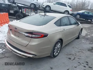 2017 Ford Fusion SE with VIN 3FA6P0HD0HR268898, listed as a IAAI auction lot 41940765 with 128,509 mi miles and . Bid and sale history available at DreamBid. Image 4.