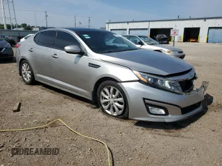 2015 Kia Optima EX с VIN 5XXGN4A71FG385837, выставлен на аукционе Copart как лот 60113905 с пробегом 172 274 миль миль и Списание • Salvage title. История ставок и продаж доступна на DreamBid. Изображение 4.
