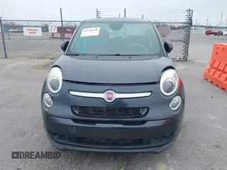 2014 FIAT 500L Easy with VIN ZFBCFABH1EZ011485, listed as a IAAI auction lot 41598470 with 69,036 mi miles and . Bid and sale history available at DreamBid. Image 6.