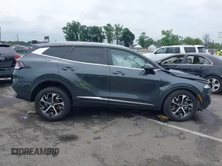 2023 Kia Sportage EX with VIN KNDPVCAG1P7110909, listed as a IAAI auction lot 42646436 with 16,304 mi miles and . Bid and sale history available at DreamBid. Image 13.
