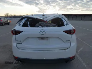 2019 Mazda CX-5 Sport with VIN JM3KFABMXK1655302, listed as a IAAI auction lot 41901293 with 140,369 mi miles and . Bid and sale history available at DreamBid. Image 16.