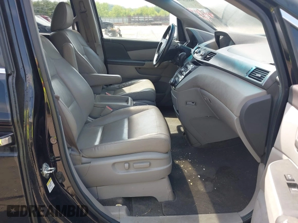 2011 Honda Odyssey EX-L with VIN 5FNRL5H69BB037248, listed as a IAAI auction lot 42613070 with 101,008 mi miles and . Bid and sale history available at DreamBid. Image 5.