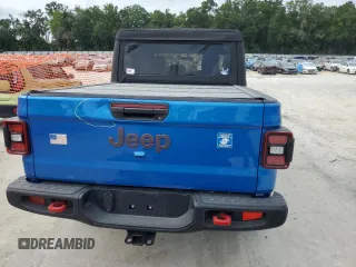2022 Jeep Gladiator Rubicon with VIN 1C6JJTBG4NL111323, listed as a Copart auction lot 58772405 with 25,997 mi miles and Salvage title. Bid and sale history available at DreamBid. Image 6.