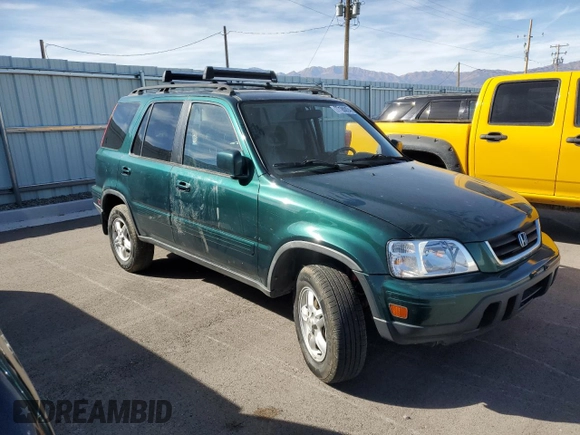 2001 Honda CR-V SE with VIN JHLRD18781C022253, listed as a Copart auction lot 77185924 with 190,434 mi miles and Salvage Title. Bid and sale history available at carsss.com. Image 4.