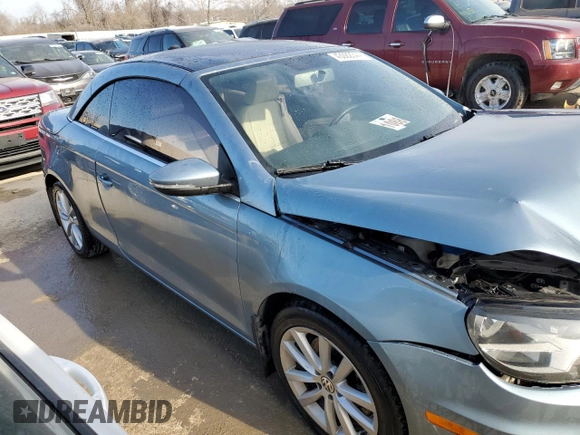 2015 Volkswagen Eos Komfort with VIN WVWBW8AH2FV000829, listed as a Copart auction lot 43082344 with 68,099 mi miles and Salvage Title. Bid and sale history available at DreamBid. Image 4.
