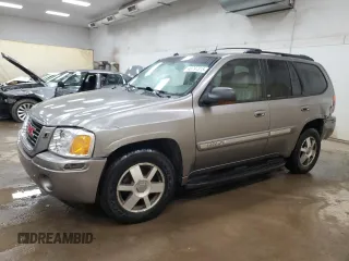 2005 GMC Envoy SLE with VIN 1GKDS13S952383743, listed as a Copart auction lot 43797315 with 185,833 mi miles and Salvage Title. Bid and sale history available at carsss.com. Image 1.