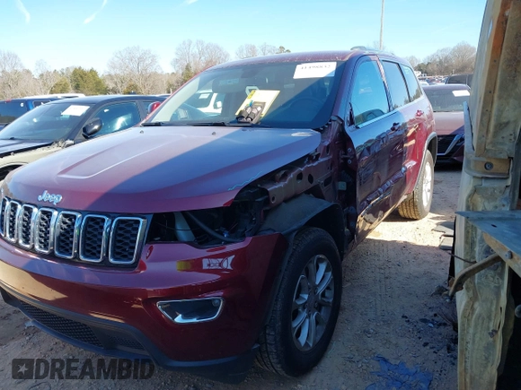 2021 Jeep Grand Cherokee Laredo E with VIN 1C4RJEAG3MC785745, listed as a IAAI auction lot 41498832 with 62,380 mi miles and . Bid and sale history available at DreamBid. Image 18.