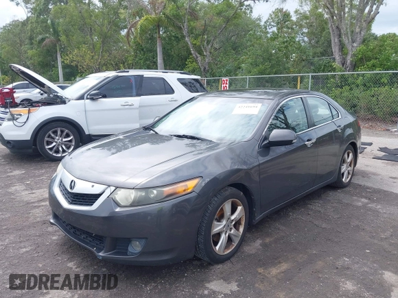 2009 Acura TSX with VIN JH4CU26609C021322, listed as a IAAI auction lot 42241694 with Not provided miles and . Bid and sale history available at DreamBid. Image 6.