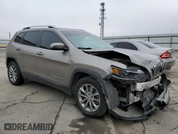 2021 Jeep Cherokee Altitude with VIN 1C4PJLLB3MD169129, listed as a Copart auction lot 82715734 with 59,468 mi miles and Salvage Title. Bid and sale history available at carsss.com. Image 4.
