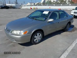 2000 Toyota Camry CE z VIN JT2BG22K4Y0394606, wystawiony jako IAAI lot #42342175 z przebiegiem 245 616 mil mil oraz . Historia ofert i sprzedaży dostępna na DreamBid. Obrazek 2.