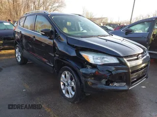 2014 Ford Escape Titanium with VIN 1FMCU0JX0EUC21512, listed as a IAAI auction lot 41781026 with 142,771 mi miles. Bid and sale history available at carsss.com. Image 1.