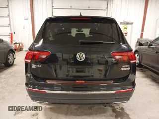 2021 Volkswagen Tiguan SE with VIN 3VV2B7AXXMM034880, listed as a IAAI auction lot 41979636 with 34,490 mi miles and . Bid and sale history available at DreamBid. Image 17.