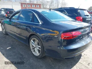 2016 Audi A8 L 4.0T Sport with VIN WAU43AFD1GN022253, listed as a IAAI auction lot 41858053 with 219,517 mi miles. Bid and sale history available at carsss.com. Image 3.