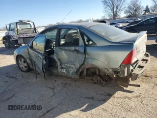 2003 Ford Focus ZTS with VIN 1FAFP38393W115936, listed as a Copart auction lot 42598715 with 100,610 mi miles and Salvage Title. Bid and sale history available at carsss.com. Image 2.