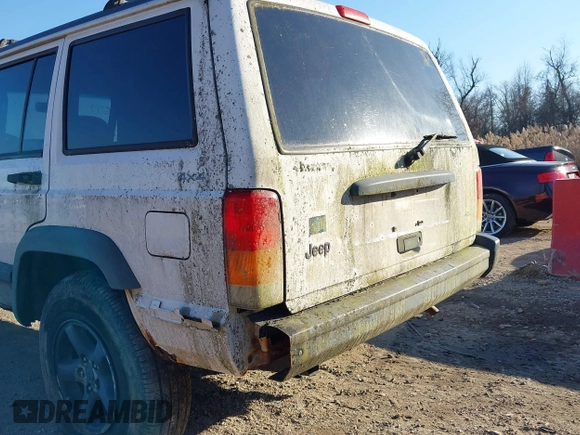 1997 Jeep Cherokee Sport with VIN 1J4FJ68S3VL551278, listed as a IAAI auction lot 41660577 with 282,264 mi miles. Bid and sale history available at carsss.com. Image 11.