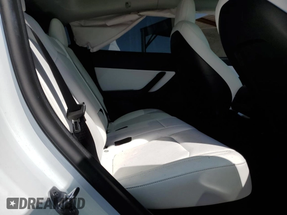 2022 Tesla Model Y Long Range z VIN 7SAYGDEEXNF455766, wystawiony jako Copart lot #49641685 z przebiegiem 51 142 mil mil oraz Szkoda całkowita • Salvage title. Historia ofert i sprzedaży dostępna na DreamBid. Obrazek 11.