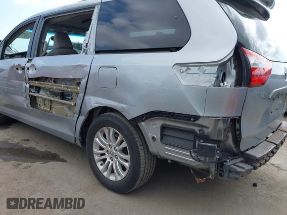 2015 Toyota Sienna XLE with VIN 5TDYK3DC1FS611521, listed as a IAAI auction lot 42136356 with 102,734 mi miles. Bid and sale history available at carsss.com. Image 6.
