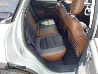 2023 Ford Bronco Sport Outer Banks z VIN 3FMCR9C64PRD05448, wystawiony jako IAAI lot #42375732 z przebiegiem 53 538 mil mil oraz . Historia ofert i sprzedaży dostępna na DreamBid. Obrazek 8.