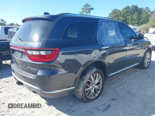 2014 Dodge Durango Citadel with VIN 1C4SDJETXEC390326, listed as a IAAI auction lot 40620779 with 119,537 mi miles and . Bid and sale history available at DreamBid. Image 4.