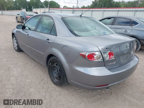 2006 Mazda 6 i with VIN 1YVFP80CX65M36617, listed as a IAAI auction lot 42059906 with 189,192 mi miles. Bid and sale history available at carsss.com. Image 3.