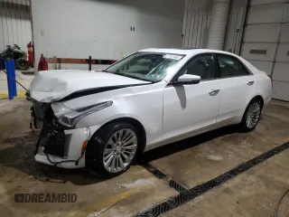 2015 Cadillac CTS Luxury AWD with VIN 1G6AX5SX6F0118332, listed as a Copart auction lot 87112464 with 82,045 mi miles and Salvage Title. Bid and sale history available at DreamBid. Image 1.