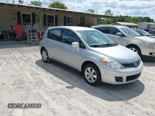 2012 Nissan Versa S with VIN 3N1BC1CP2CK278929, listed as a IAAI auction lot 42080650 with 169,609 mi miles. Bid and sale history available at carsss.com. Image 1.