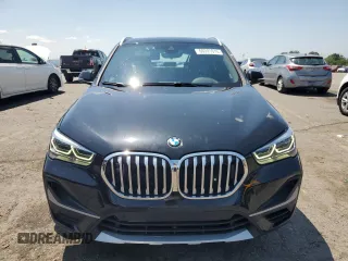 2021 BMW X1 xDrive28i with VIN WBXJG9C06M5S33201, listed as a Copart auction lot 66391015 with 53,395 mi miles and Salvage title. Bid and sale history available at DreamBid. Image 5.