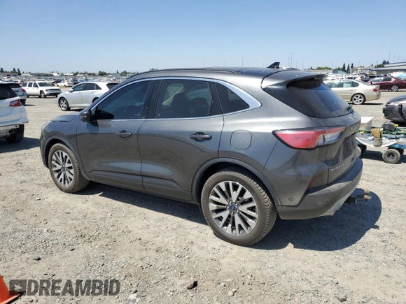 2020 Ford Escape Titanium Hybrid with VIN 1FMCU9DZ4LUA79387, listed as a Copart auction lot 62174835 with 82,486 mi miles and Salvage title. Bid and sale history available at DreamBid. Image 2.