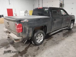2015 Chevrolet Silverado 1500 LT with VIN 3GCUKREC4FG286409, listed as a IAAI auction lot 41150467 with 162,088 mi miles. Bid and sale history available at carsss.com. Image 4.