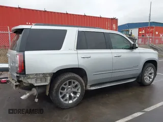 2015 GMC Yukon SLT with VIN 1GKS2BKCXFR131919, listed as a IAAI auction lot 41664827 with 149,398 mi miles. Bid and sale history available at carsss.com. Image 14.