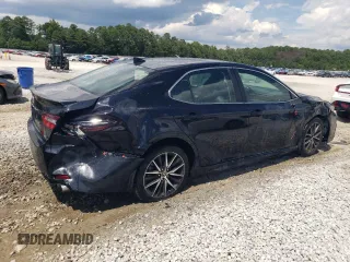 2024 Toyota Camry SE with VIN 4T1G11AK9RU890727, listed as a Copart auction lot 64234294 with 18,768 mi miles and Salvage Title. Bid and sale history available at carsss.com. Image 3.