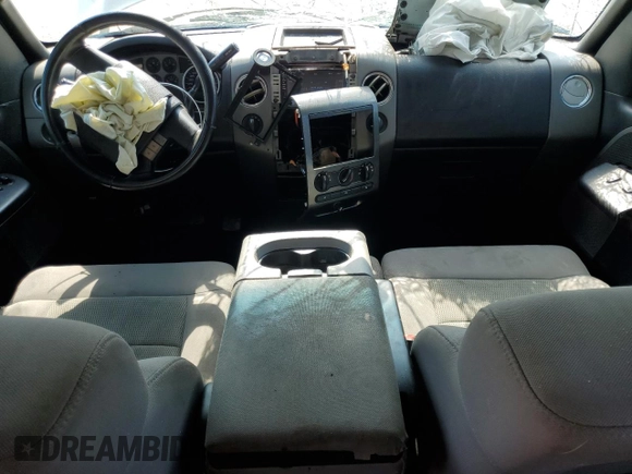 2005 Ford F-150 XLT with VIN 1FTPW14535FA80553, listed as a Copart auction lot 59230285 with 242,408 mi miles and Salvage title. Bid and sale history available at DreamBid. Image 8.