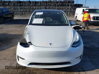 2023 Tesla Model Y Long Range z VIN 7SAYGDEE5PF765326, wystawiony jako IAAI lot #41757113 z przebiegiem 10 461 mil mil oraz . Historia ofert i sprzedaży dostępna na DreamBid. Obrazek 13.