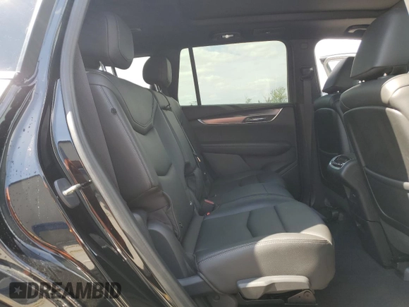 2023 Cadillac XT6 FWD Luxury z VIN 1GYKPAR45PZ187400, wystawiony jako Copart lot #54562335 z przebiegiem 16 953 mil mil oraz Szkoda całkowita • Salvage title. Historia ofert i sprzedaży dostępna na DreamBid. Obrazek 11.