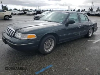 1999 Ford Crown Victoria LX z VIN 2FAFP74W2XX128075, wystawiony jako Copart lot #48794035 z przebiegiem 137 465 mil mil oraz Szkody całkowita. Historia ofert i sprzedaży dostępna na DreamBid. Obrazek 1.