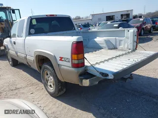 2002 Chevrolet Silverado 1500 LT with VIN 2GCEK19T021290878, listed as a IAAI auction lot 41715052 with 299,629 mi miles. Bid and sale history available at carsss.com. Image 3.
