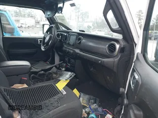 2021 Jeep Wrangler Sport S with VIN 1C4GJXAN6MW677281, listed as a IAAI auction lot 40814351 with 55,360 mi miles and . Bid and sale history available at DreamBid. Image 5.