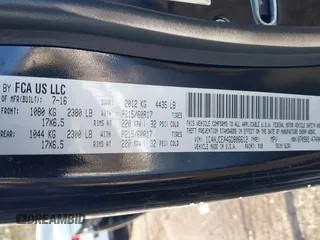 2016 Jeep Compass High Altitude Edition with VIN 1C4NJCEA4GD806612, listed as a IAAI auction lot 41538090 with 104,447 mi miles. Bid and sale history available at carsss.com. Image 9.