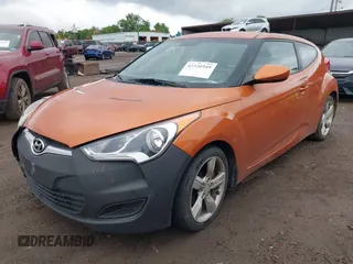 2012 Hyundai Veloster w/Gray Int with VIN KMHTC6AD3CU057620, listed as a IAAI auction lot 42320549 with 113,491 mi miles and . Bid and sale history available at DreamBid. Image 17.