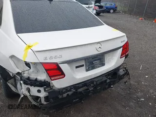2014 Mercedes-Benz E 550 Sport with VIN WDDHF9BBXEA940995, listed as a IAAI auction lot 41872452 with 50,451 mi miles and . Bid and sale history available at DreamBid. Image 6.