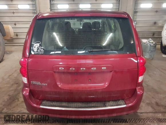 2014 Dodge Grand Caravan SE with VIN 2C4RDGBG5ER379315, listed as a IAAI auction lot 41673071 with 168,569 mi miles and . Bid and sale history available at DreamBid. Image 17.