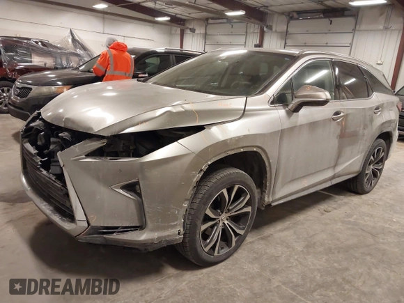 2018 Lexus RX 350L Premium z VIN JTJDZKCA6J2004385, wystawiony jako IAAI lot #41382429 z przebiegiem 111 638 mil mil oraz . Historia ofert i sprzedaży dostępna na DreamBid. Obrazek 19.