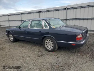 2001 Jaguar XJ with VIN SAJDA14C41LF38763, listed as a Copart auction lot 86796434 with 60,076 mi miles and Clean Title. Bid and sale history available at carsss.com. Image 2.