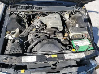 1991 Mercury Cougar z VIN 1MEPM60T2MH600363, wystawiony jako Copart lot #76543714 z przebiegiem 169 767 mil mil oraz Szkoda całkowita • Salvage title. Historia ofert i sprzedaży dostępna na DreamBid. Obrazek 11.