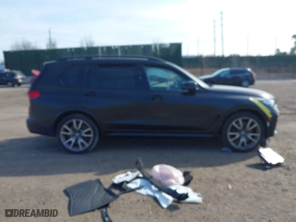 2022 BMW X7 M50i with VIN 5UXCX6C03N9M51772, listed as a IAAI auction lot 41780026 with 26,001 mi miles. Bid and sale history available at carsss.com. Image 13.